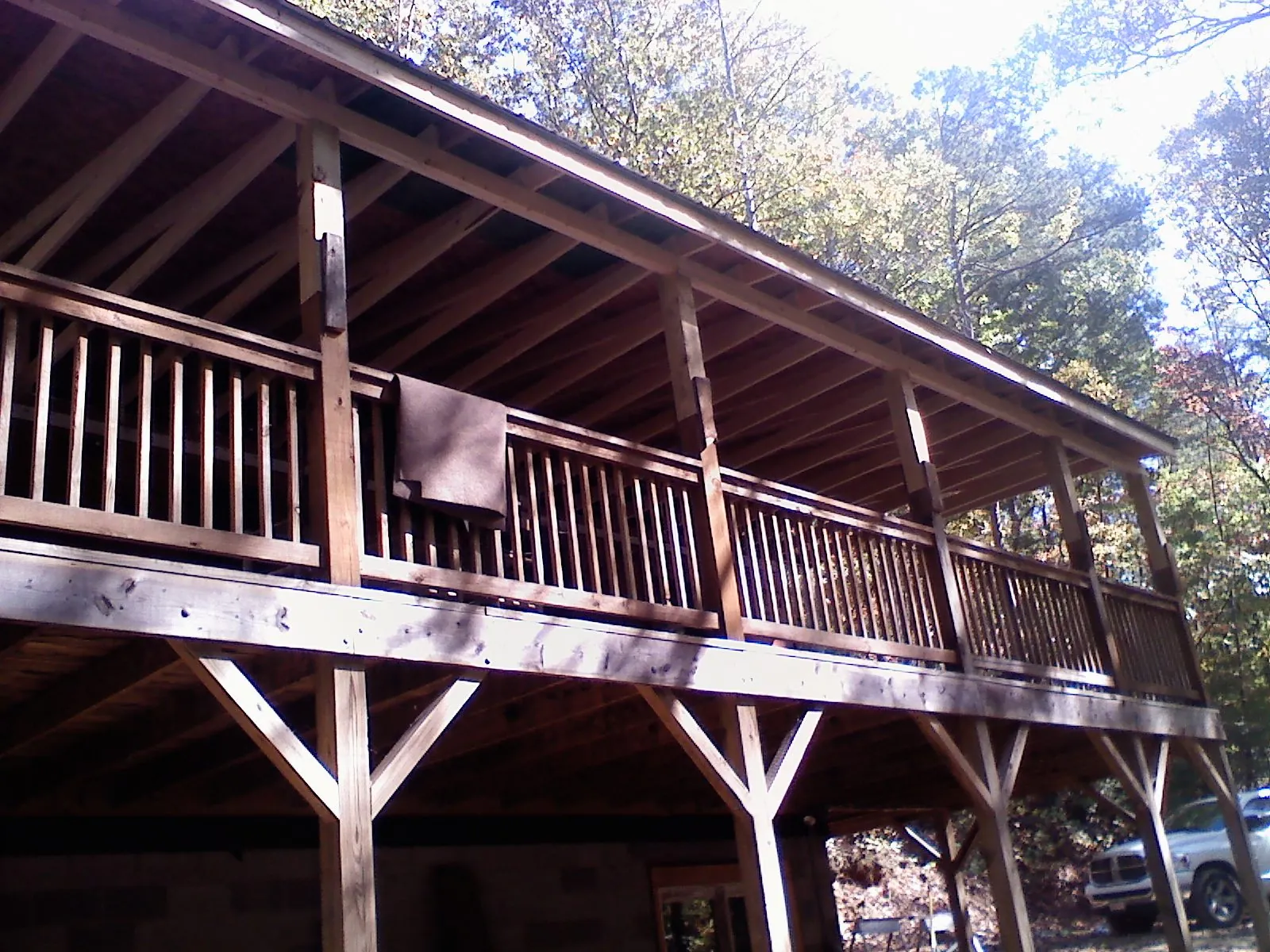 Timber framing under a new elevated porch and deck — Roof Leak Repair in Altadena by Roofing Brothers